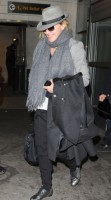 Madonna arriving at JFK airport, New York, April 12th 2011 (3)