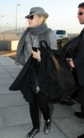Madonna leaving London, Heathrow Airport, April 12th 2011 (1)