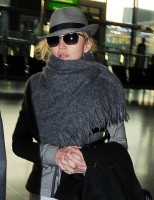 Madonna leaving London, Heathrow Airport, April 12th 2011 (12)