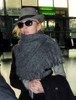 Madonna leaving London, Heathrow Airport, April 12th 2011 (13)
