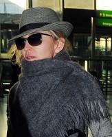 Madonna leaving London, Heathrow Airport, April 12th 2011 (14)