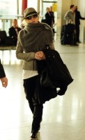 Madonna leaving London, Heathrow Airport, April 12th 2011 (15)