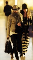 Madonna leaving London, Heathrow Airport, April 12th 2011 (16)