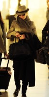 Madonna leaving London, Heathrow Airport, April 12th 2011 (18)