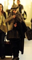 Madonna leaving London, Heathrow Airport, April 12th 2011 (21)