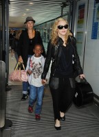 Madonna arrives at Heathrow airport, London (12)