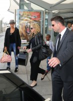 Madonna arrives at Heathrow airport, London (17)