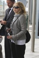 Madonna and family arriving at Heathrow Airport, London (2)