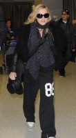 Madonna arrives at JFK airport on her way to London, 21 October 2011 (5)