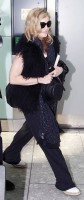 Madonna at Heathrow airport, October 24 2011 (7)