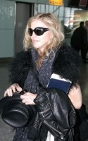 Madonna at Heathrow airport, October 24 2011 (8)