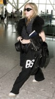 Madonna at Heathrow airport, October 24 2011 (11)
