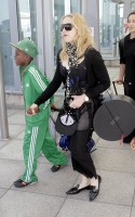 Madonna arrives at Heathrow Airport in London - 19 July 2013 - update (5)