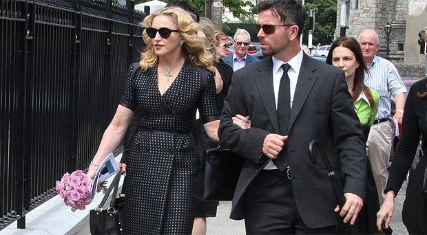 20130723-news-madonna-david-collins-fune