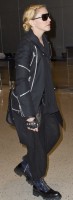 Madonna arrives at JFK airport, New York - 14 October 2013 (3)