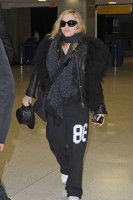 Madonna arrives at JFK airport on her way to London, 21 October 2011 (1)