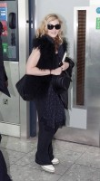 Madonna at Heathrow airport, October 24 2011 (3)