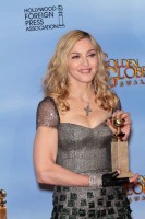 Madonna at the Golden Globes Press Room, 15 January 2012 - Update 01 (49)