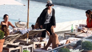 1 December 2012 - Madonna At the Ipanema beach, Rio de Janeiro (8)