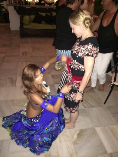 Madonna at Mert Alas surprise party with belly dancer Didem 11